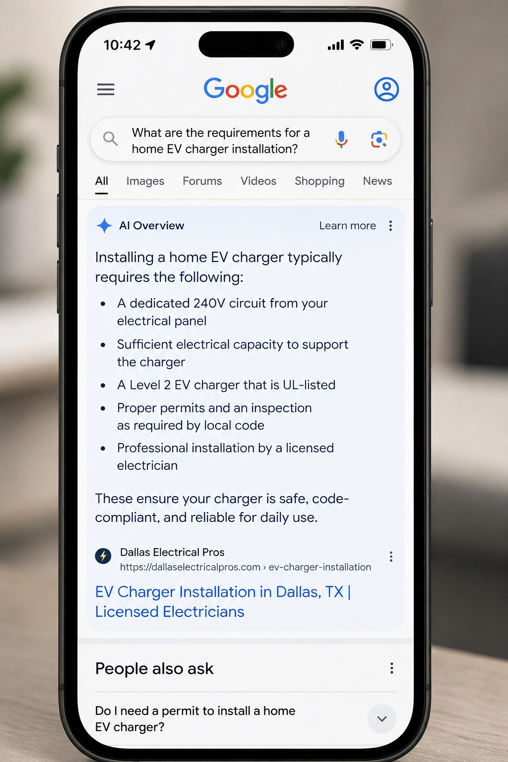 Mobile Google search showing an AI Overview about home EV charger installation with a citation to a local electrician website.