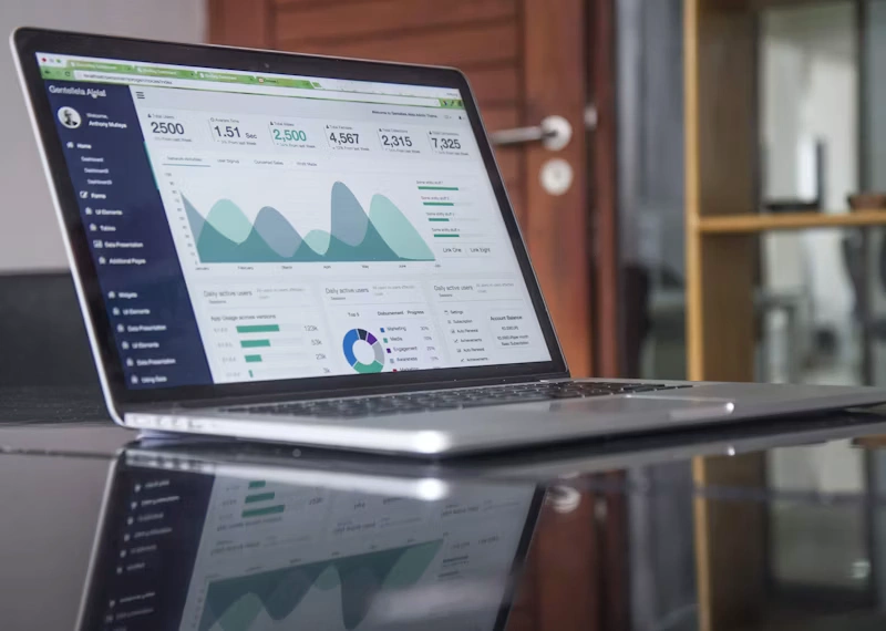 Laptop displaying website analytics dashboard for monitoring SEO performance and technical optimization